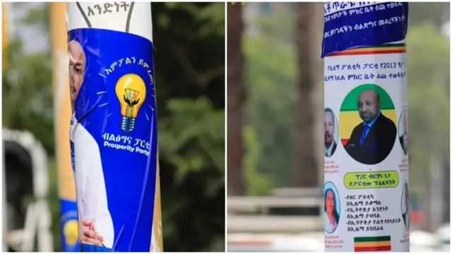 የኢዜማ እና የብልጽግና ፓርቲዎች ፖስተር በስልክ እንጨቶች ላይ ተለጥፎ