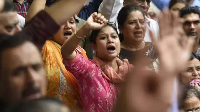 પ્રદર્શન કરતી મહિલાઓની પ્રતીકાત્મક તસવીર