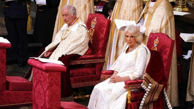 King Charles III and Queen Camilla during their coronation ceremony in Westminster Abbey, London. Picture date: Saturday May 6, 2023.