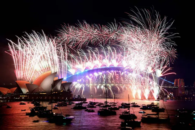 Fireworks light up the sky over Sydney's Harbour Bridge and Opera House