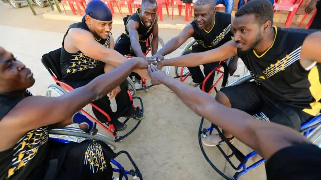 he Tibiya team warms up as they attend the first wheelchair basketball tournament in Sudan, to mark the International Day of Persons with Disabilities at the Omdurman Youth Centre, Sudan December 4, 2016.