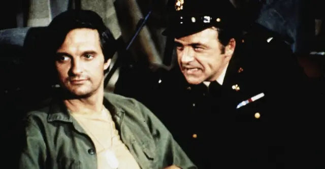 Alan Alda and Ed Flanders in an episode of M*A*S*H in 1972