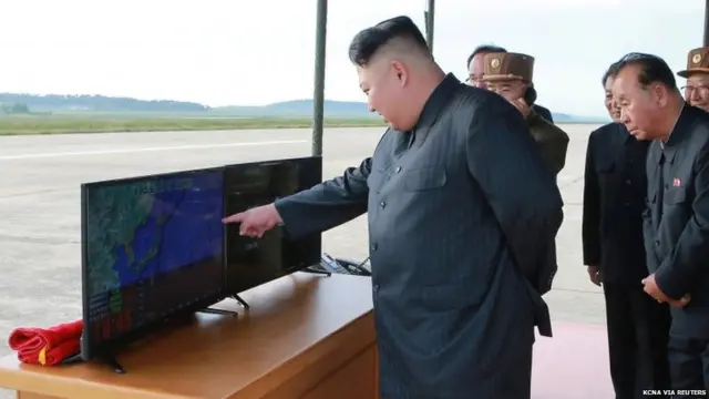 Kim Jong-un at the test of a Hwasong-12 missile, undated KCNA photo released on 16 September 2017