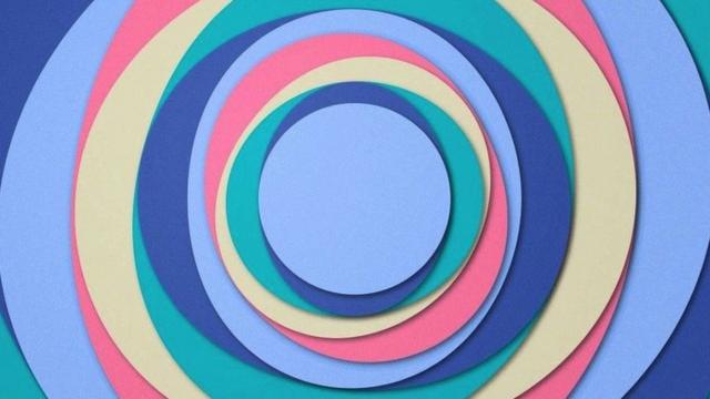 一系列不同顏色的圓圈，如紫色、靛藍色、綠色、奶油色和粉紅色