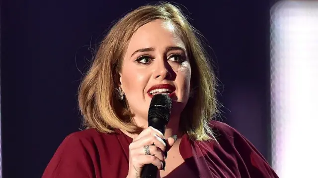 Adele performing in February 2016