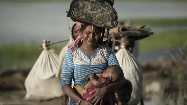 หญิงโรฮิงญาคนนี้ข้ามแม่น้ำนาฟจากเมียนมาเข้าสู่บังกลาเทศเมื่อเดือนตุลาคม 2017