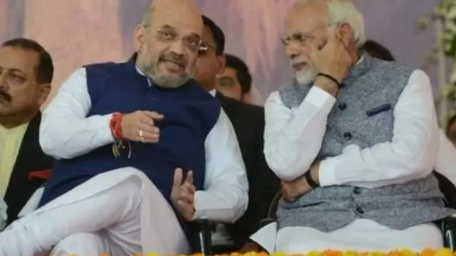 મોદી અને અમિત શાહની તસવીર