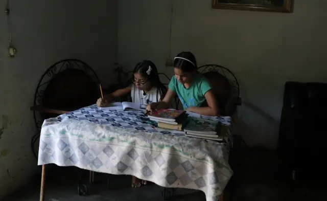 Valeria Torres with one of her students