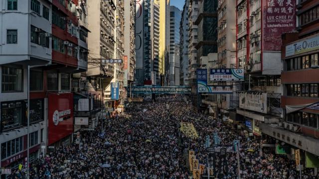 Protesters fill a street in Hong Kong