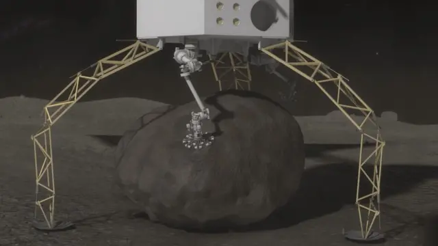 Una sonda recogiendo una enorme roca