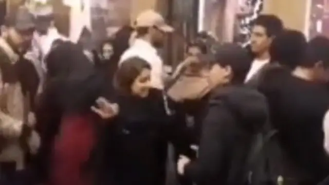 Video purportedly showing men and women dancing at a shopping centre in Mashhad, Iran