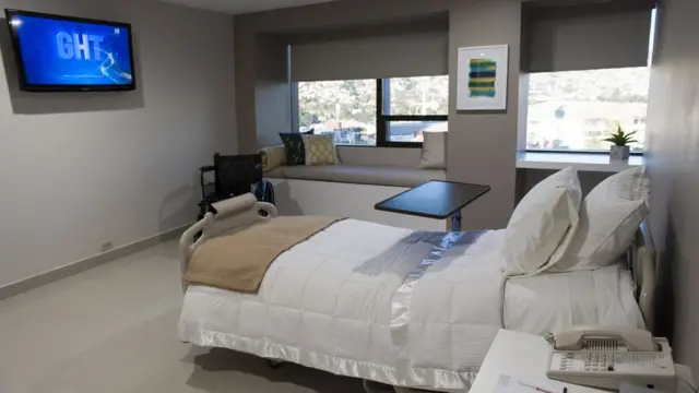 Una habitación de Grand Care