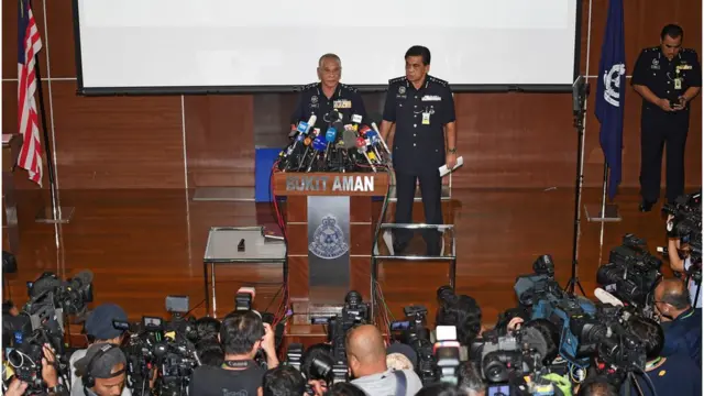 Royal Malaysian Police deputy inspector-general Noor Rashid Ibrahim (L) speaks during a press conference at the Bukit Aman national police headquarters in Kuala Lumpur on February 19, 2017