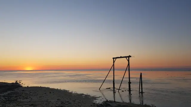 Ostrvo Heron na Velikom koralnom grebenu u zalazak sunca