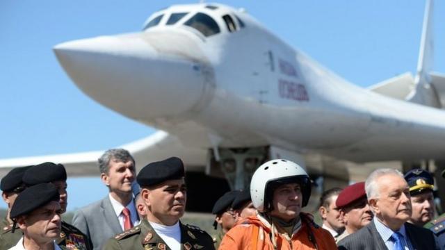 Venezuelan Defence Minister Vladimir Padrino (first row, second from left) pictured in front of a Russian Tupolev Tu-160 aircraft