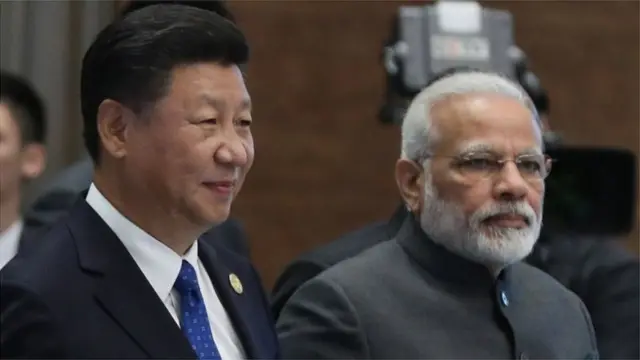চীনা প্রেসিডেন্ট শি জিনপিং এবং ভারতের প্রধানমন্ত্রী নরেন্দ্র মোদি। দুই দেশের সম্পর্কে সম্প্রতি কিছুটা উত্তেজনা তৈরি হয়েছিল।