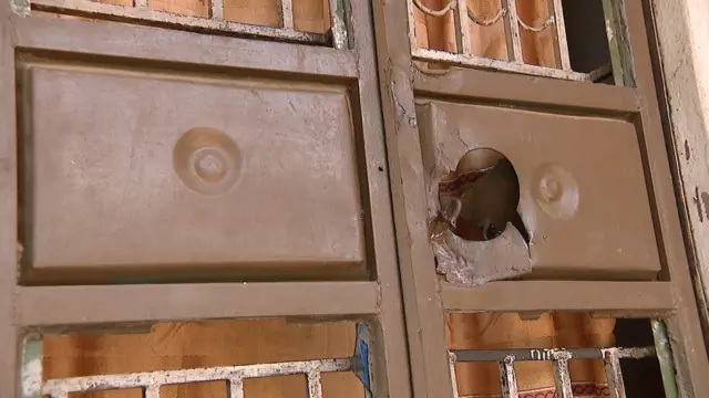 Broken panel on a door