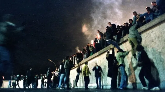 On 9 November 1989, there were scenes of great celebration in Berlin as thousands of people flooded across the Berlin Wall