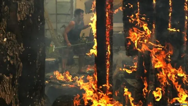 California's fire service said about 73,000 acres (30,000 hectares) have