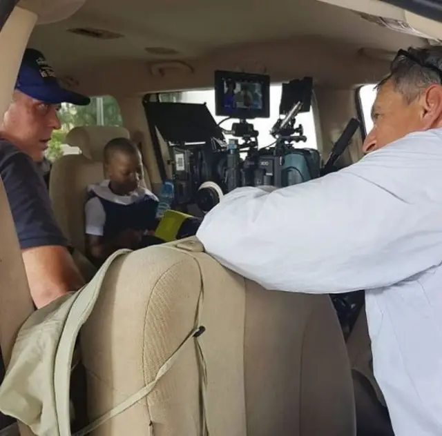 Emmanuella siddon inside moto with some directors.