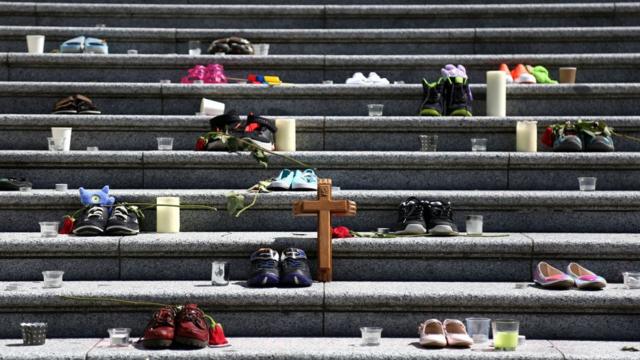 Childrens' shoes at a makeshift memorial in Vancouver
