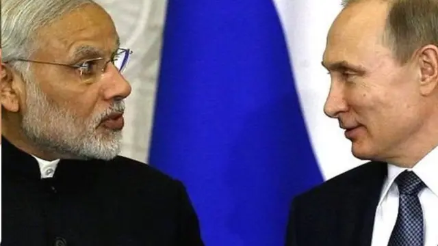 મોદીની અને પુતિનની તસવીર