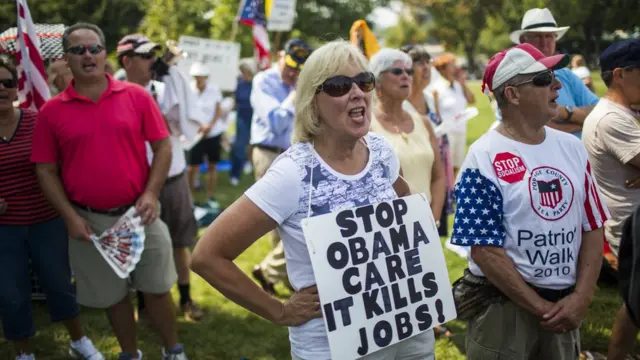 Протестующие против "Обамакер"