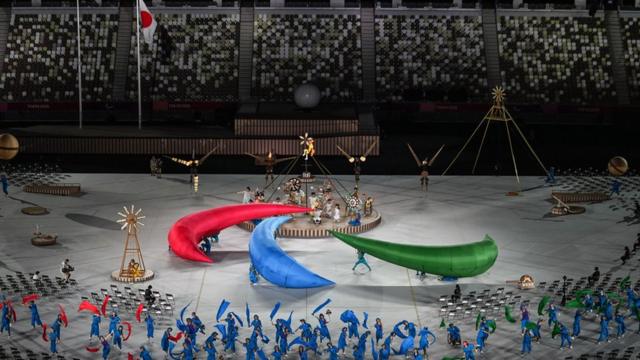 Performers take part in the opening ceremony for the Tokyo 2020 Paralympic Games at the Olympic Stadium in Tokyo on August 24, 2021