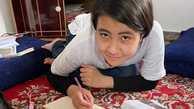 Parwana doing her home work