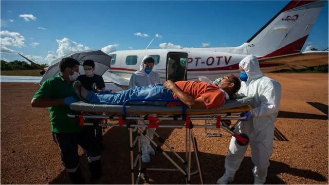 Man near air ambulance, Brazil