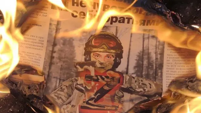 горить газета