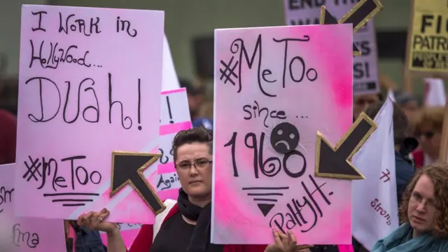 Demonstrators participate in the #MeToo Survivors' March