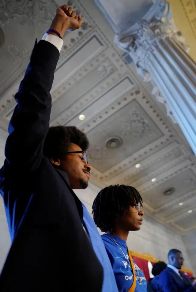 epresentative Justin Pearson gestures from the house gallery after Representative Jones returned to the house floor after his reinstatement days after the Republican majority Tennessee House of Representatives voted to expel both of them for their roles in a gun control demonstration on the statehouse floor, at the Tennessee State Capitol in Nashville, Tennessee, U.S., April 10, 2023.