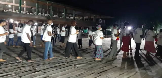 "Prophet TB Joshua burial": Temitope Balogun Joshua wife Evelyn Joshua lead 'funeral candlelight procession' by [Synagogue Church, Emmanuel TV]