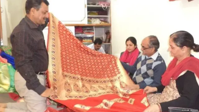 कपड़ा व्यापारी