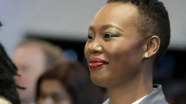 Stella Ndabeni-Abrahams in a meeting
