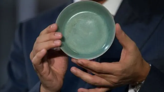 Di original plan wey make dem design di bowl na to use am dey wash brush.