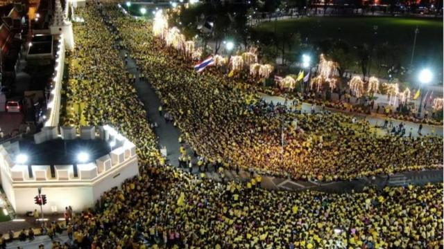 Drone aerial view shows as supporters of Thailand"s King Maha Vajiralongkorn and Queen Suthida wait for them outside the Grand Palace in Bangkok, Thailand, November 1, 2020.