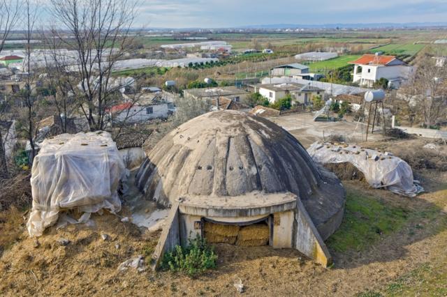 Bunker in Albania that is being used to house hay bales