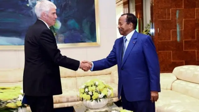 US Ambassador to Cameroon Peter Henry Barlerin and Cameroon President Paul Biya