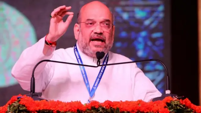 केरल के कोझिकोड में भाजपा राष्ट्रीय परिषद की बैठक को संबोधित करते पार्टी के राष्ट्रीय अध्यक्ष अमित शाह.