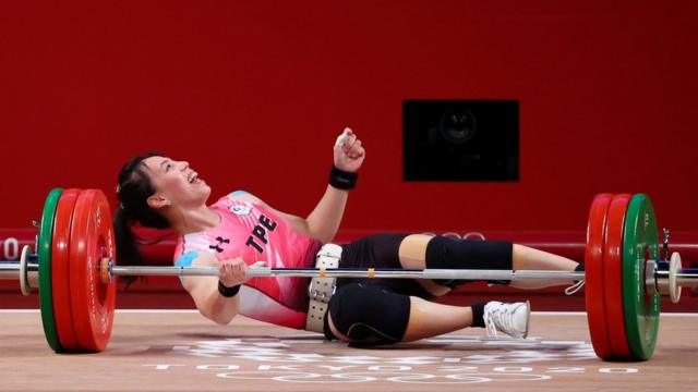 Tokyo 2020 Olympics - Weightlifting - Women"s 59kg - Group A - Tokyo International Forum, Tokyo, Japan - July 27, 2021. Kuo Hsing-Chun of Taiwan reacts after failing a lift.