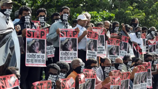 Sri Lankan opposition politicians and media activists stage a sit-down demonstration in the capital Colombo on June 10, 2009. The activists are denouncing the wave of physical attacks against independent journalists and media rights activists in recent months and the latest attack earlier in the week against Poddala Jayantha, a key activist who has been fighting for media freedom. AFP PHOTO/Ishara S. KODIKARA (Photo credit should read Ishara S. KODIKARA/AFP/Getty Images)
