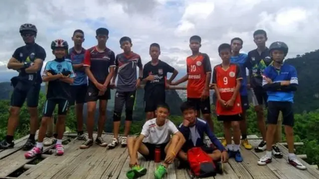 A Facebook photo shows the coach with some of the missing children
