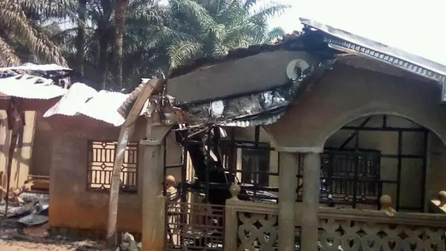 One of di houses dem burn.