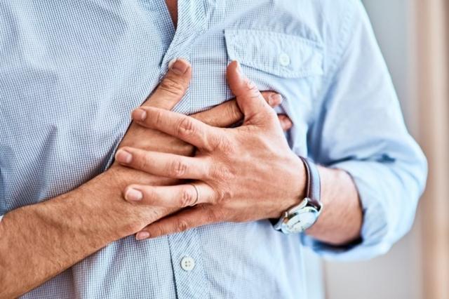Generic close-up of man with chest pain