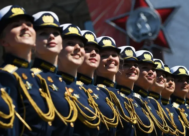 Servicewomen march during a Victory Day military parade in Red Square marking the 75th anniversary of the victory in World War II, on June 24, 2020 in Moscow,