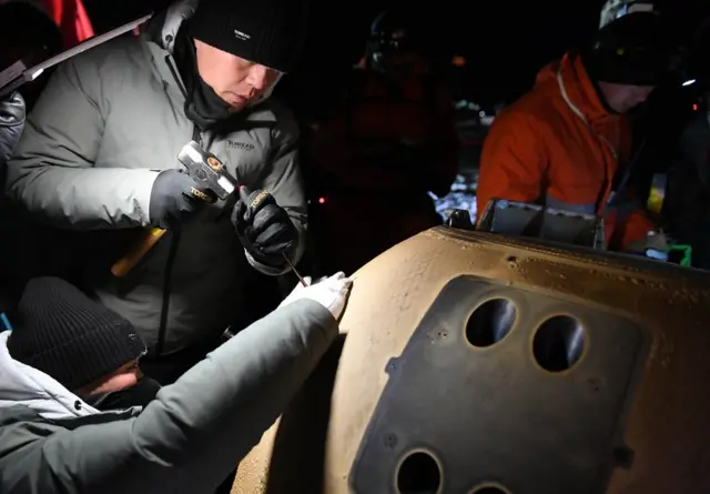 The capsule's contents will be removed in a dedicated laboratory