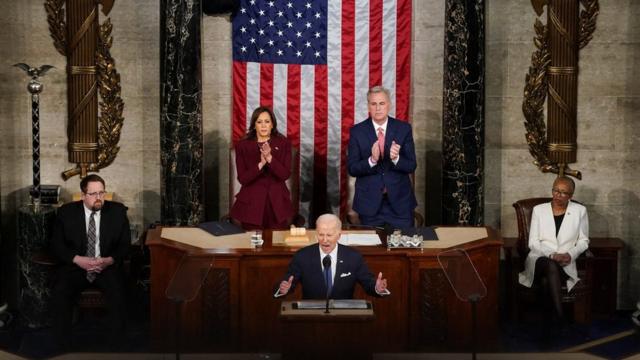 U.S. President Joe Biden delivers his State of the Union address before a joint session of Congress as Vice President Kamala Harris and Speaker of the House Kevin McCarthy applaud in the House Chamber at the U.S. Capitol in Washington, U.S., February 7, 2023