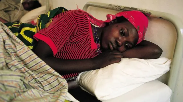 Une mère sans sommeil au lit